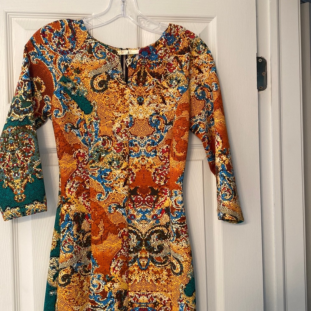 Must have! Fun, colorful hug your curves dress